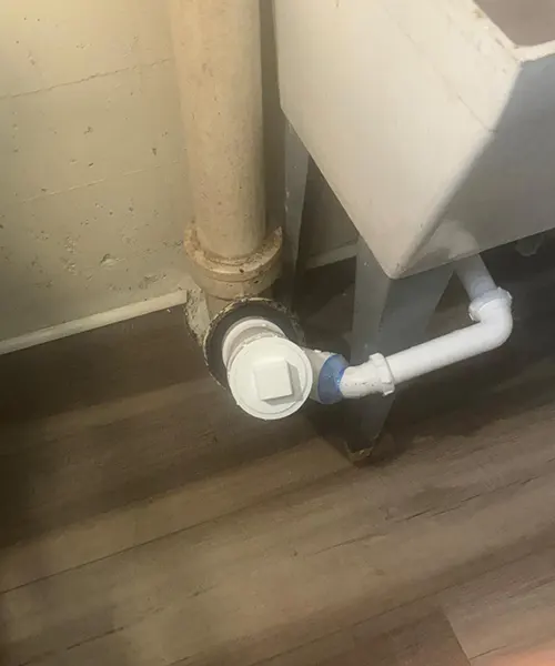 Removal of cast iron sink line and replace with pvc and clean out installation in Seattle 